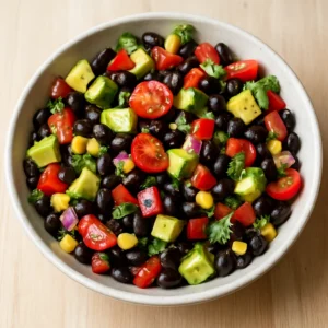 Black bean and corn salad with tomatoes, avocado, cilantro, and Salsa Fresca dressing